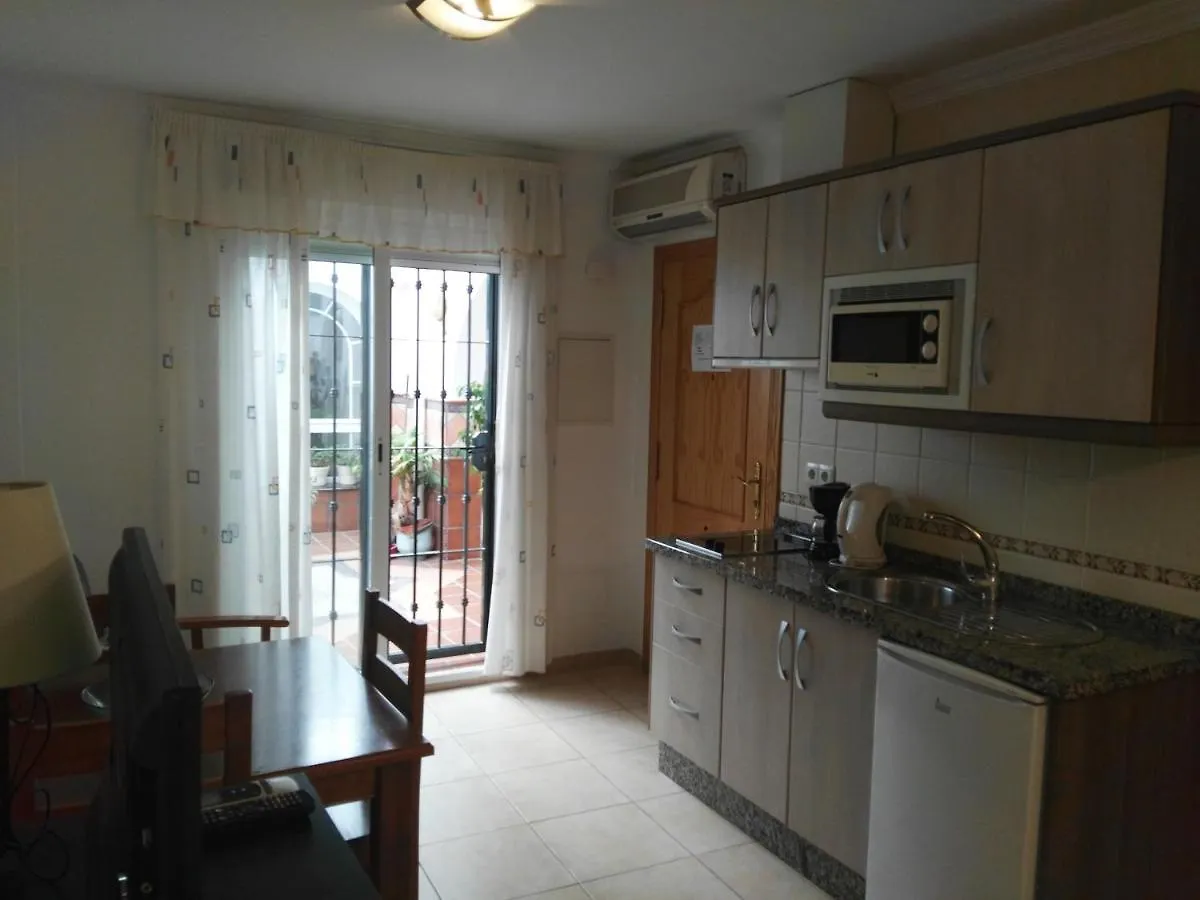 Апартаменты Apartamentos El Barrio Нерха